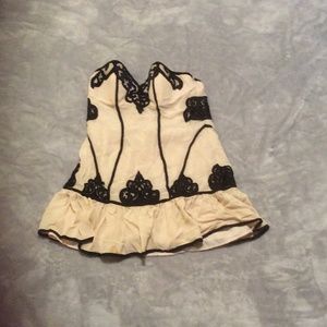 Short strapless dress size L, by BEBE